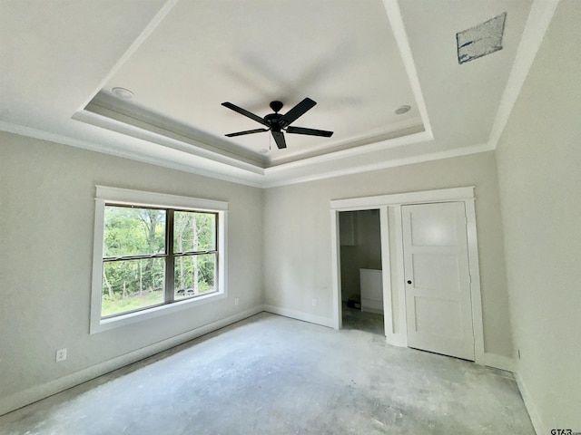 2514 N Glass, Tyler, TX 75702 - unfurnished bedroom featuring a raised ceiling, concrete flooring, baseboards, ornamental molding, and ceiling fan