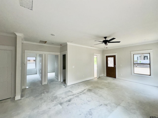 2514 N Glass, Tyler, TX 75702 - entryway featuring concrete flooring, ornamental molding, healthy amount of natural light, ceiling fan, and baseboards