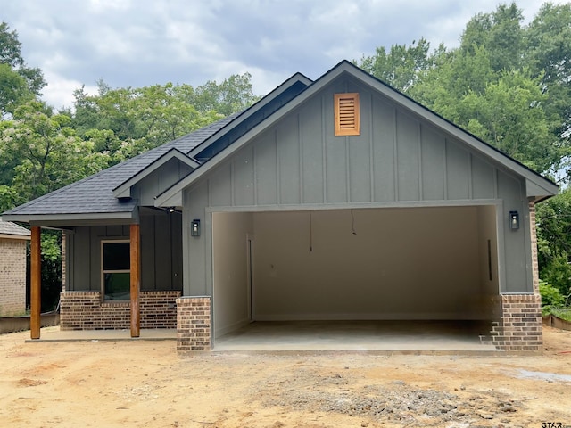 2514 N Glass, Tyler, TX 75702 - view of front of property featuring brick siding, board and batten siding, and a shingled roof