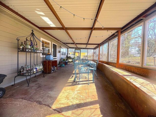 sunroom / solarium featuring plenty of natural light