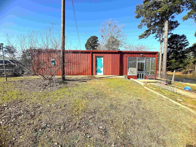 exterior space featuring a front lawn