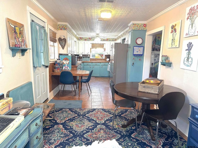 tiled dining space with ornamental molding