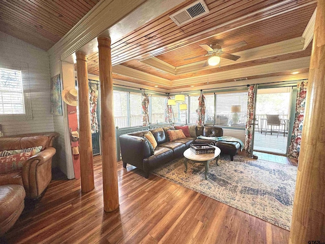 living room featuring wood ceiling, a wealth of natural light, and hardwood / wood-style flooring