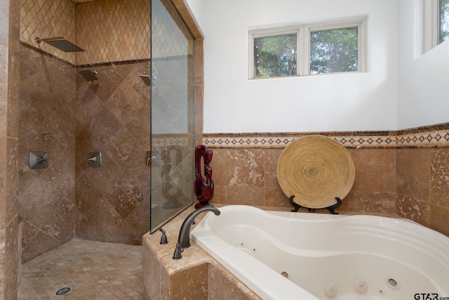 bathroom with independent shower and bath