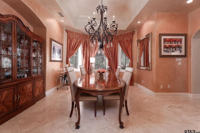 dining area with a chandelier