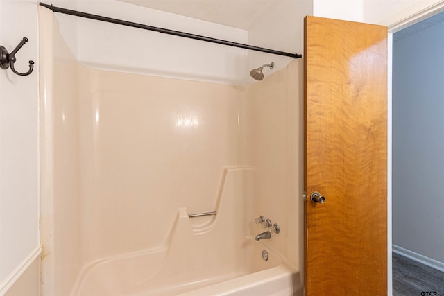 405 Brookview Ln, Palestine, TX 75803 - bathroom with shower / bathtub combination and wood finished floors