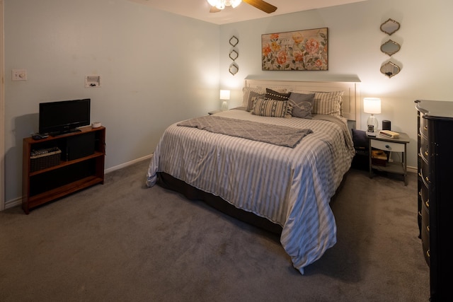 bedroom featuring a ceiling fan, dark carpet, and baseboards