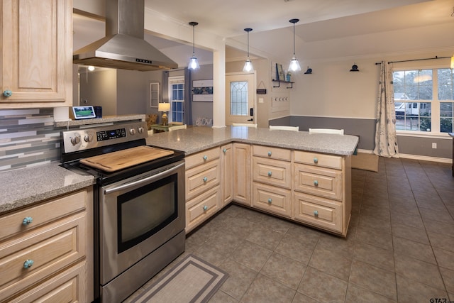 kitchen with decorative backsplash, a peninsula, hanging light fixtures, island exhaust hood, and stainless steel range with electric stovetop