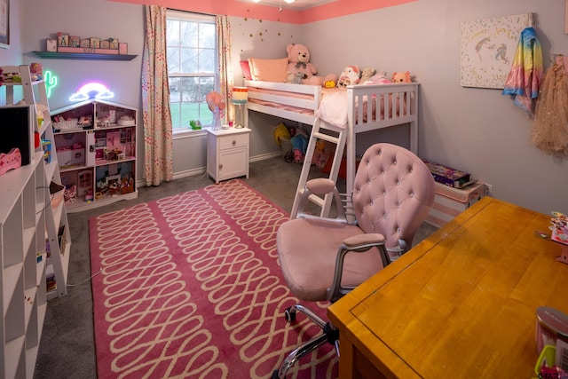 bedroom with dark colored carpet