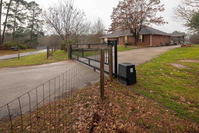 view of road with a gate