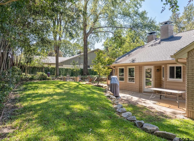 view of yard featuring a patio area