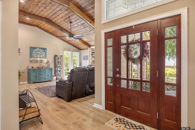 entrance foyer featuring wooden ceiling, light hardwood / wood-style floors, ceiling fan, and lofted ceiling with beams