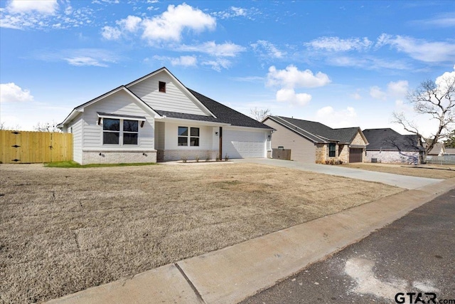 single story home featuring a garage