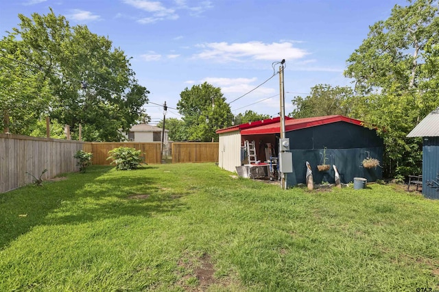 408 Morton Ave, Palacios, TX 77465 - view of yard featuring an outbuilding