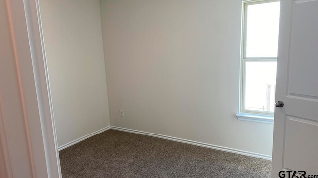 view of carpeted spare room