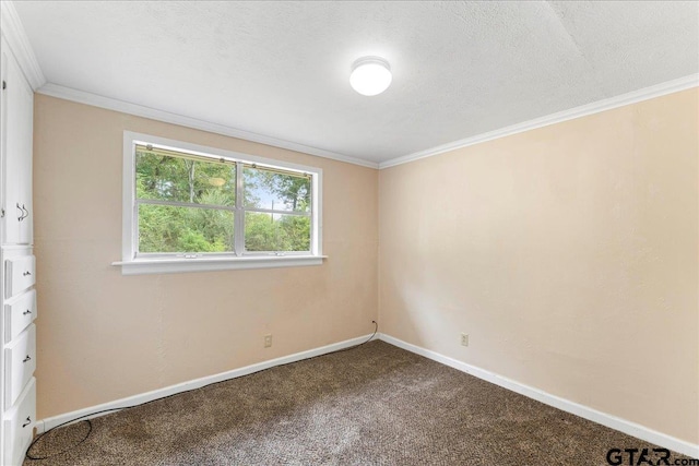 carpeted spare room with a textured ceiling and crown molding