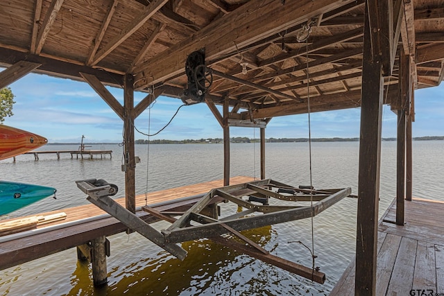 view of dock with a water view