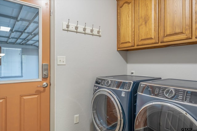 504 Susie St, Chandler, TX 75758 - laundry area with washing machine and clothes dryer and cabinet space