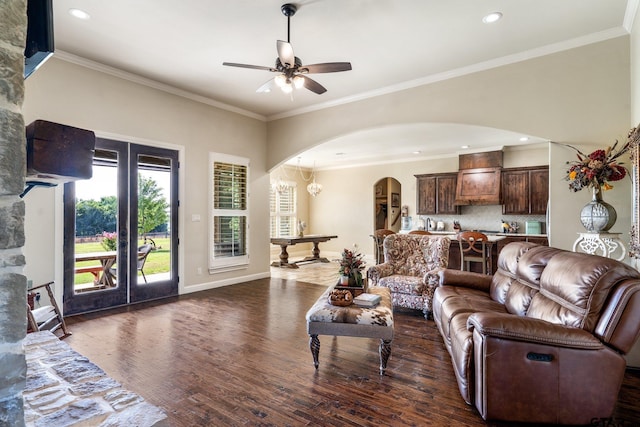 4180 N Smith Rd, Rockwall, TX 75087 - living area with arched walkways, a ceiling fan, dark wood finished floors, crown molding, and recessed lighting