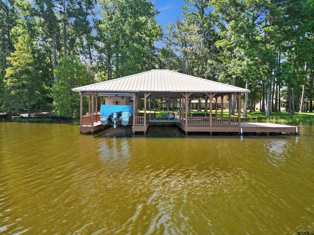 dock area featuring a water view