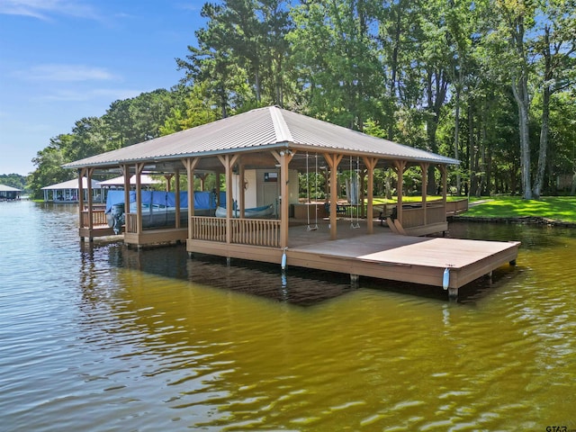 dock area featuring a water view