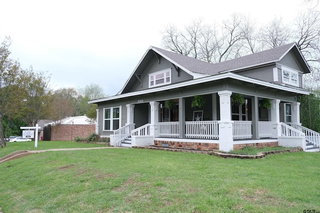 500 W Main St, Mount Vernon, TX 75457 - view of front of house with roof with shingles, a porch, and a front lawn
