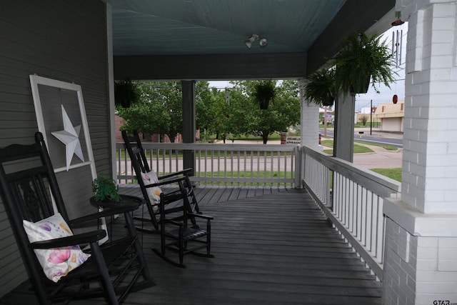 500 W Main St, Mount Vernon, TX 75457 - wooden terrace featuring a porch