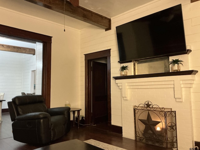 500 W Main St, Mount Vernon, TX 75457 - living area featuring a brick fireplace and beam ceiling