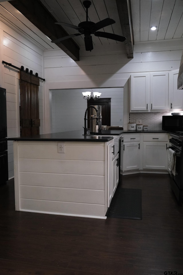 500 W Main St, Mount Vernon, TX 75457 - kitchen featuring white cabinets, a sink, beamed ceiling, ceiling fan with notable chandelier, and black appliances