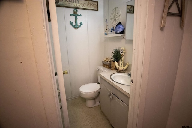 bathroom featuring toilet and vanity