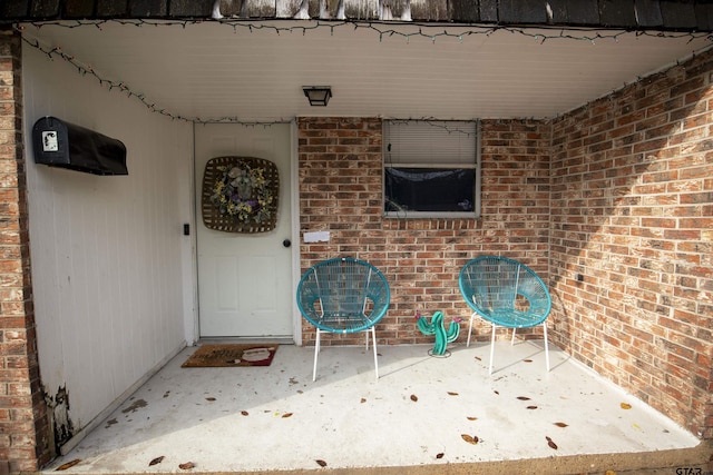 property entrance featuring a patio