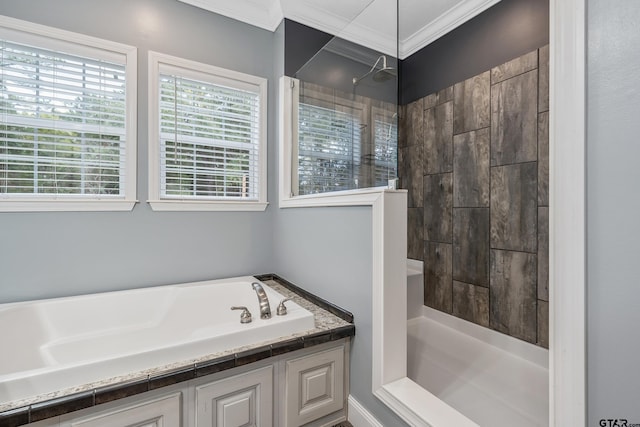 full bathroom with a healthy amount of sunlight, crown molding, a bath, and a walk in shower