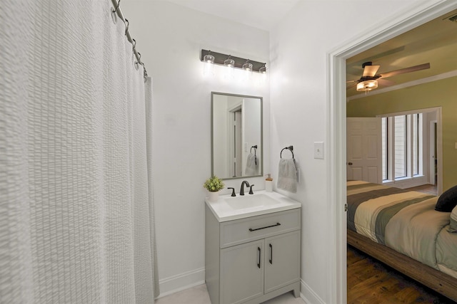 bathroom featuring vanity and ceiling fan