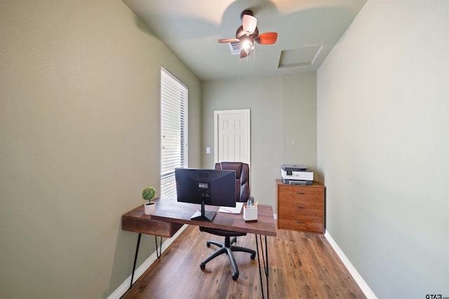 office space with hardwood / wood-style floors