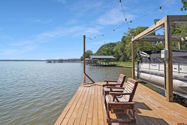 view of dock with a water view