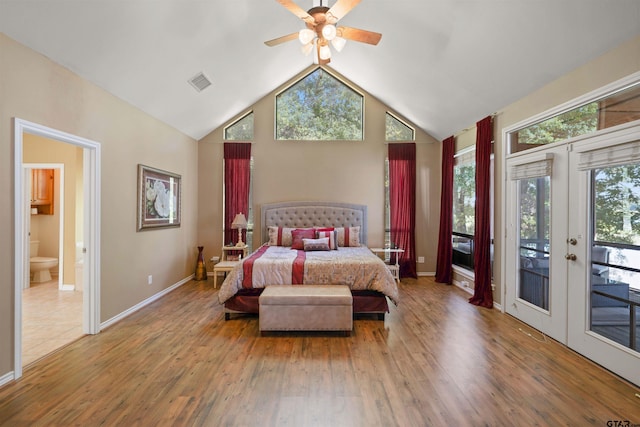 bedroom featuring access to exterior, french doors, hardwood / wood-style flooring, and ceiling fan