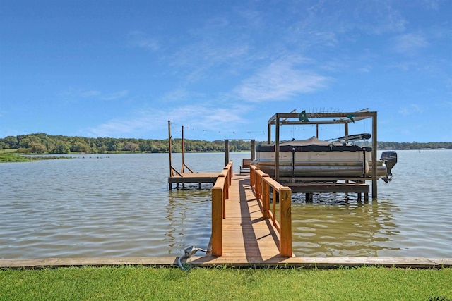 dock area featuring a water view