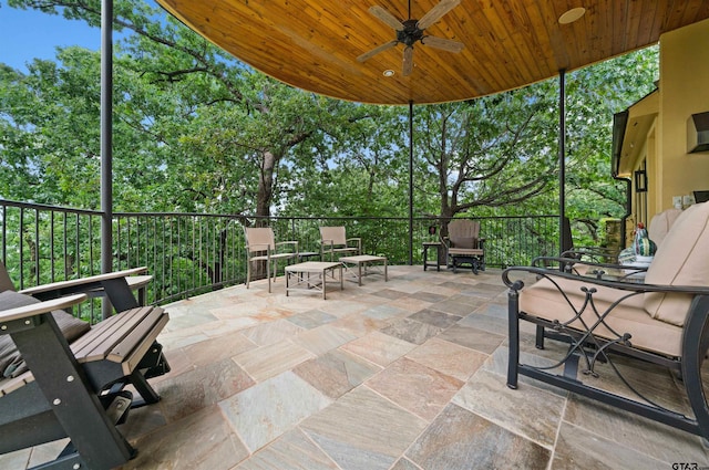 view of patio / terrace featuring ceiling fan