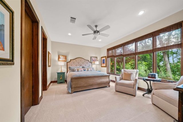 carpeted bedroom featuring ceiling fan