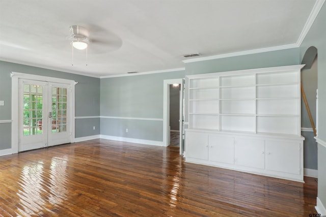 interior space with ceiling fan, ornamental molding, dark wood-type flooring, and french doors