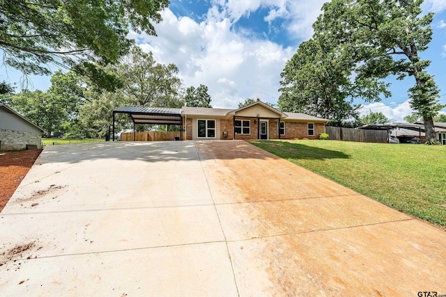 10873 Nix Ln, Whitehouse, TX 75791 - ranch-style home with concrete driveway, an attached carport, and brick siding