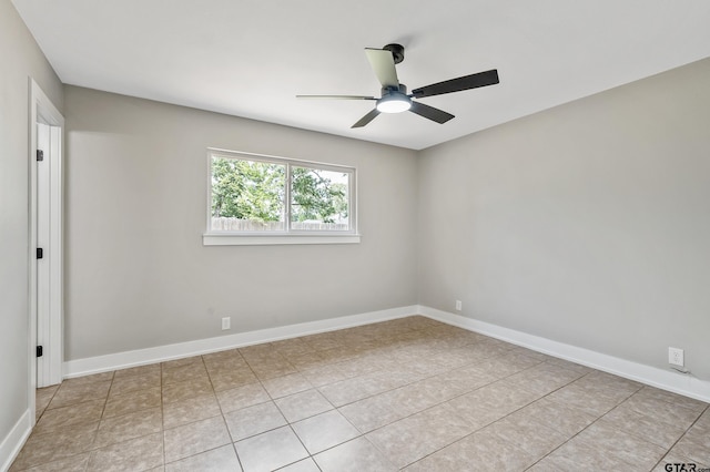 10873 Nix Ln, Whitehouse, TX 75791 - empty room with ceiling fan and tile patterned flooring