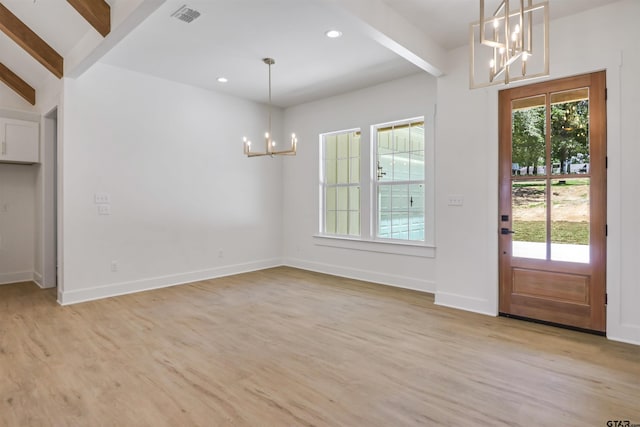 unfurnished dining area with vaulted ceiling with beams, plenty of natural light, and light wood-type flooring