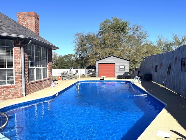 9112 Deerfield Dr, Tyler, TX 75703 - view of pool featuring a fenced backyard, a patio area, and an outdoor structure