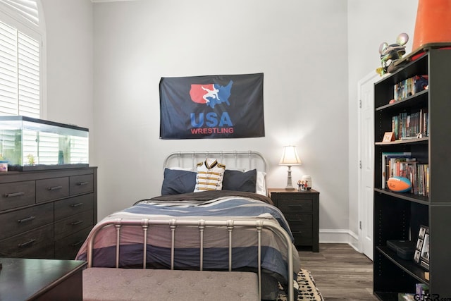 bedroom featuring wood-type flooring