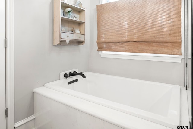 bathroom featuring a bathtub