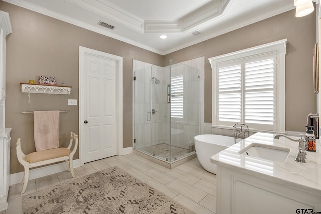 bathroom featuring tile patterned flooring, vanity, ornamental molding, and independent shower and bath