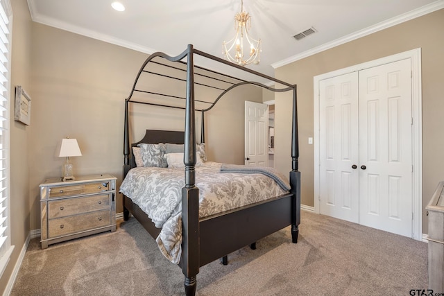 carpeted bedroom featuring a chandelier, a closet, and crown molding