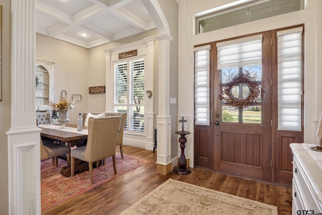 entryway featuring hardwood / wood-style floors, ornate columns, plenty of natural light, and coffered ceiling