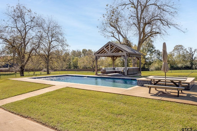 view of pool with a gazebo, an outdoor hangout area, a patio, and a lawn